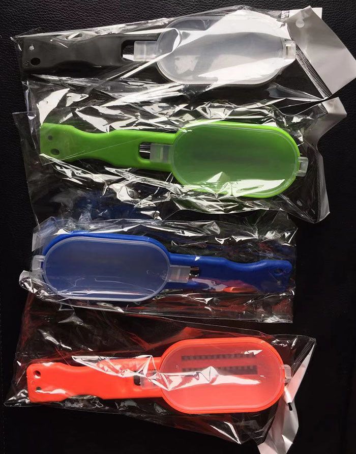 image-Fish Scale Remover Brush - Orange Stainless Steel 