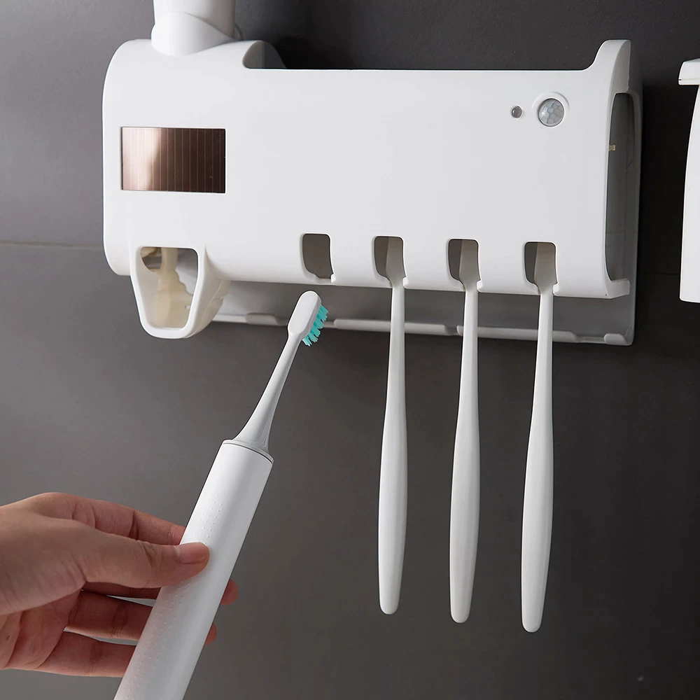 image-UV Toothbrush Sanitizer Holder & Automatic Toothpaste Dispenser 