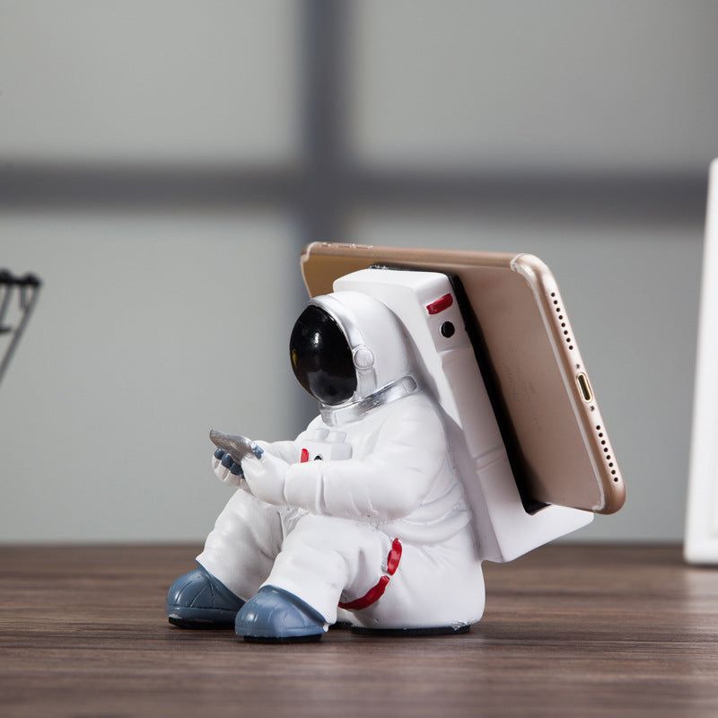 image-Astronaut Mobile Phone Stand - Resin Desktop Holder 10.6x7.3cm