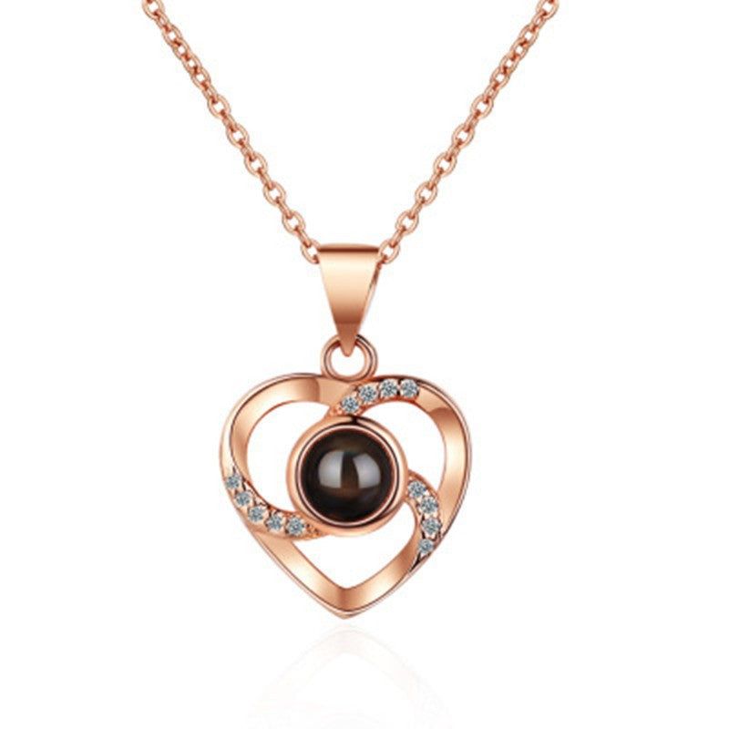 image-Sterling Silver Projection Necklace - 100 Languages Heart 