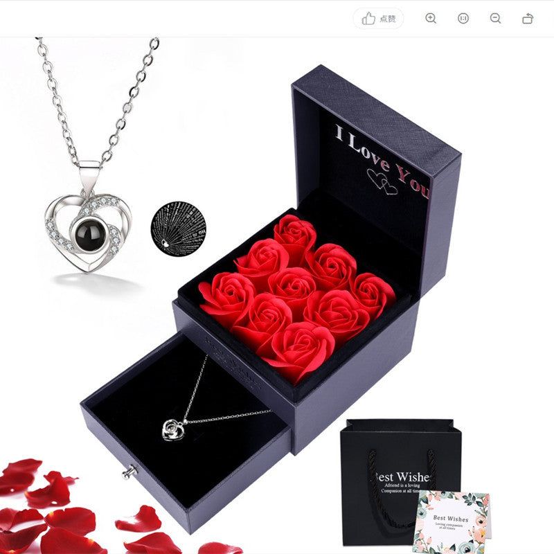 image-Sterling Silver Projection Necklace - 100 Languages Heart 
