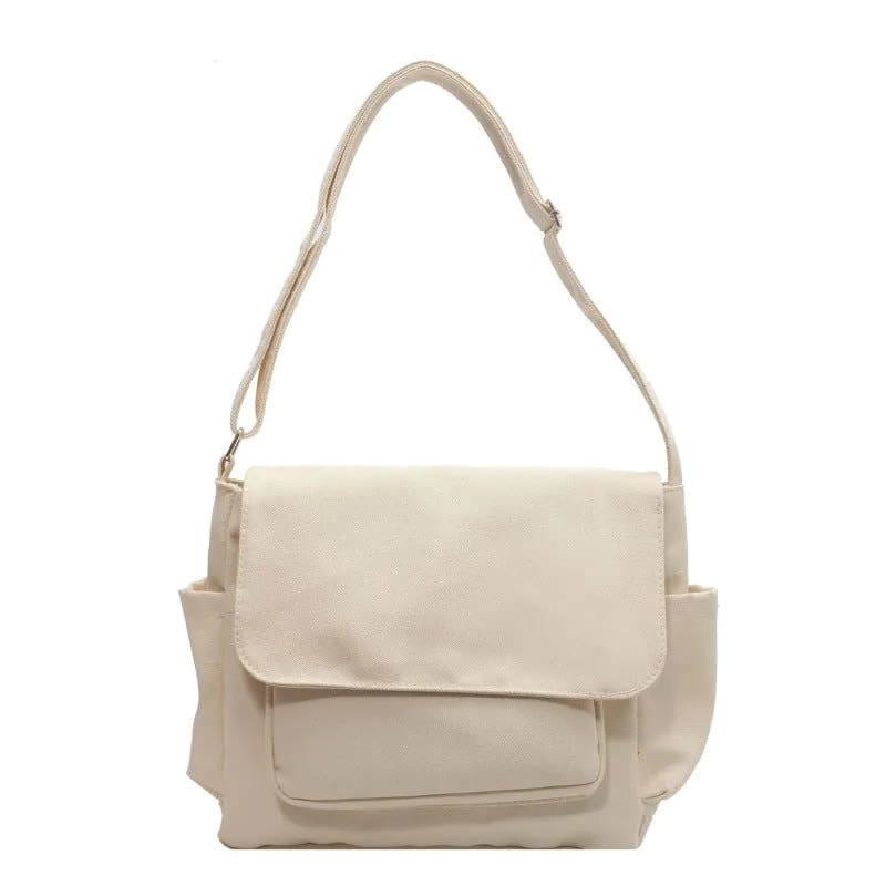 image-Canvas Crossbody Messenger Bag - Pink EARE Horizontal